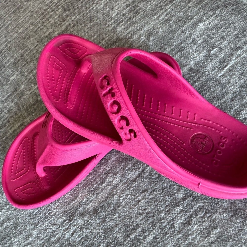 CROCS Fuchsia Flip Flops